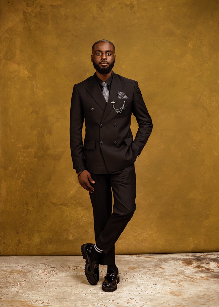 David in a black double-breasted suit