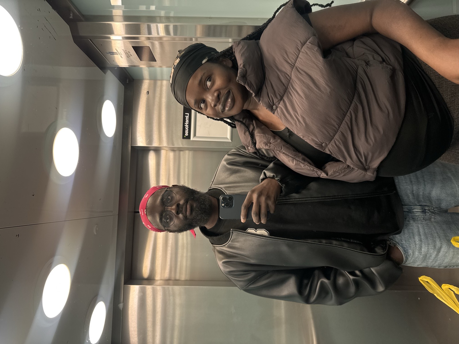 David and Adewunmi mirror selfie