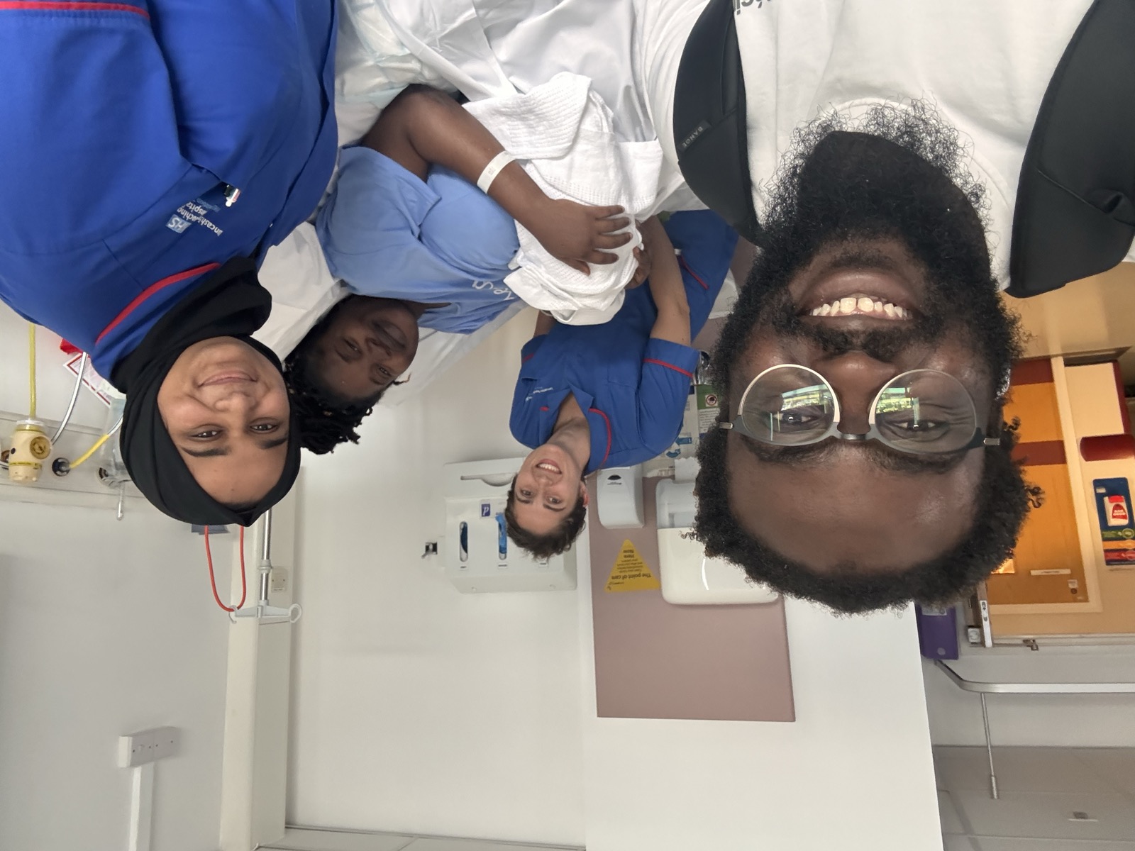 David selfie with Adewunmi and the nurses at the hospital