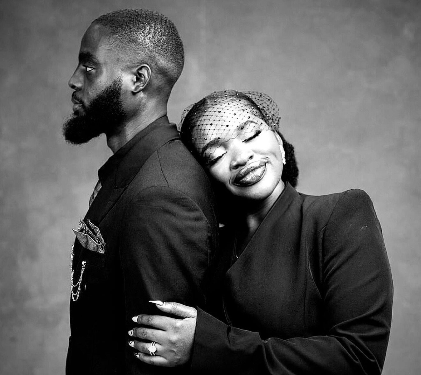 David and Adewunmi embracing