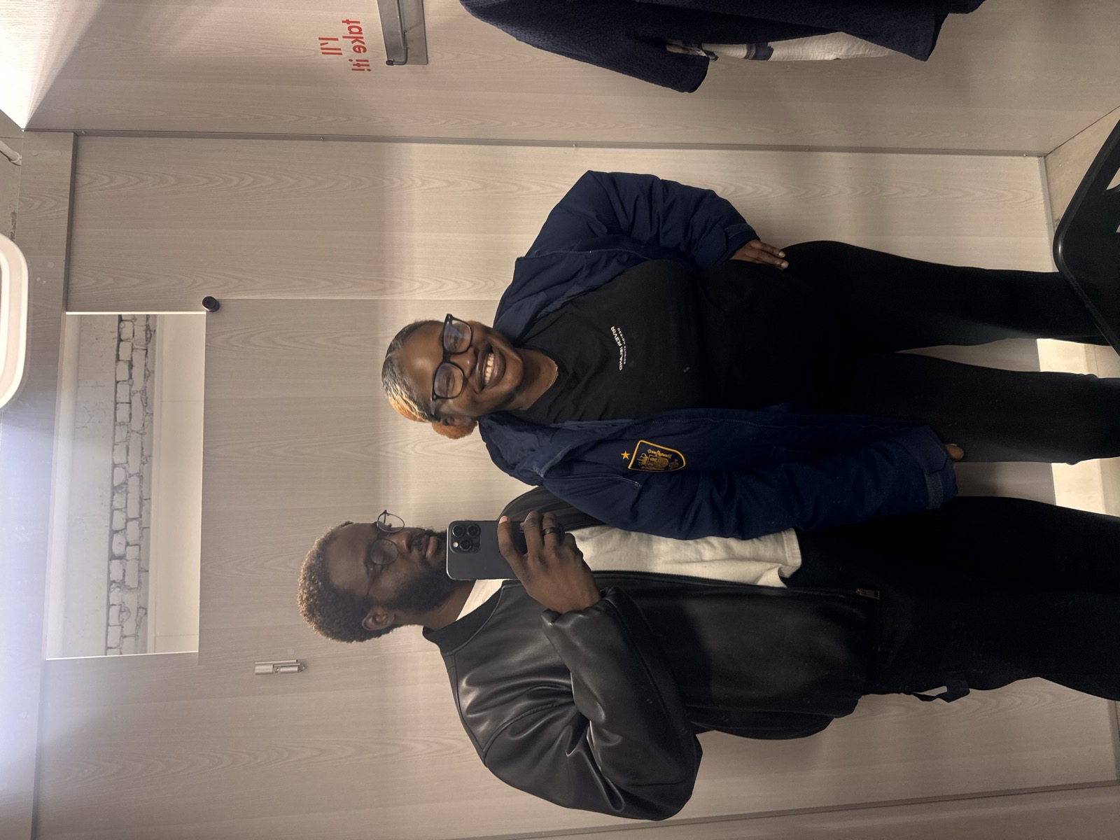 David and Adewunmi mirror selfie